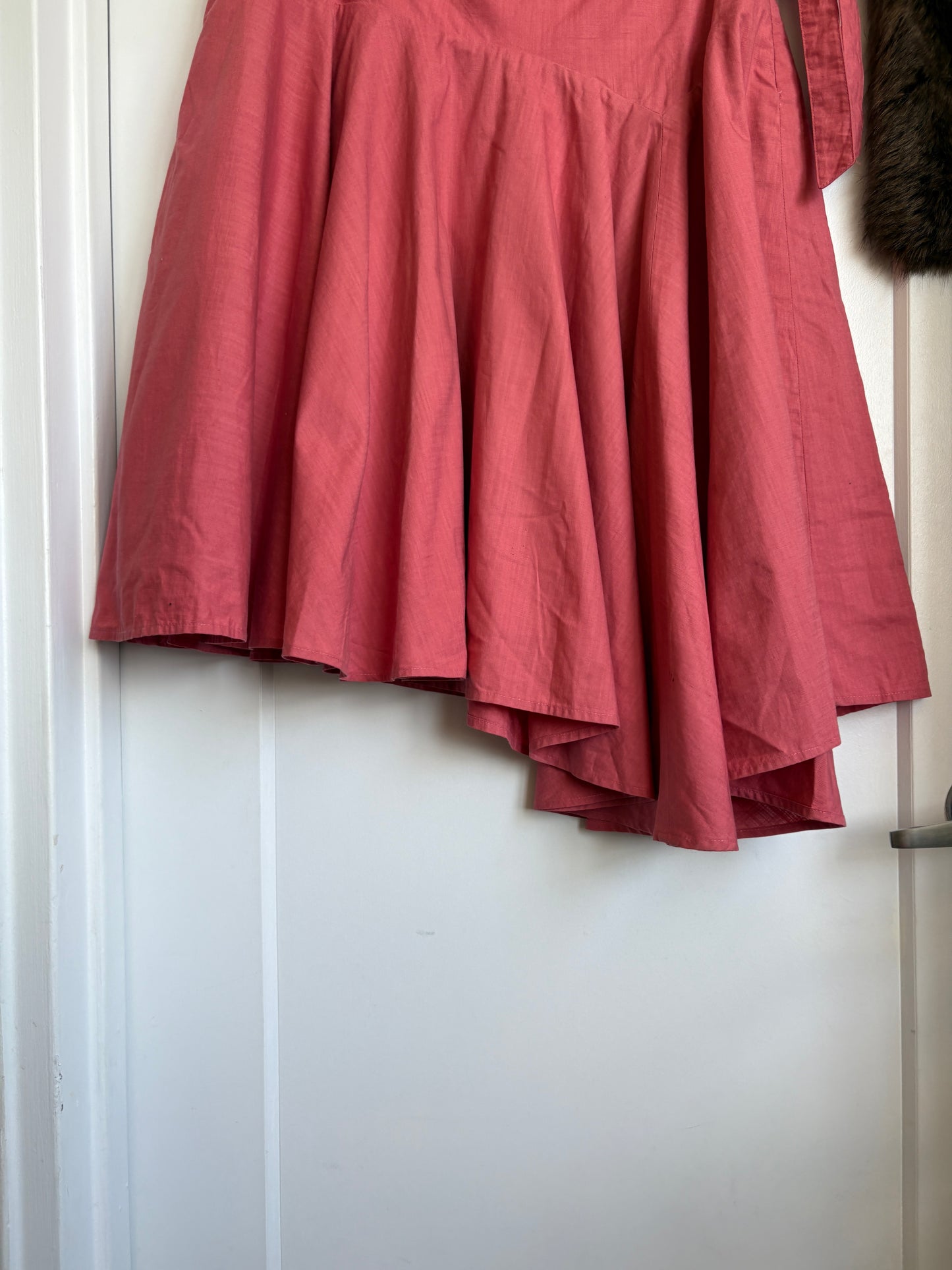 PINK ASYMMETRICAL SKIRT WITH A BOW