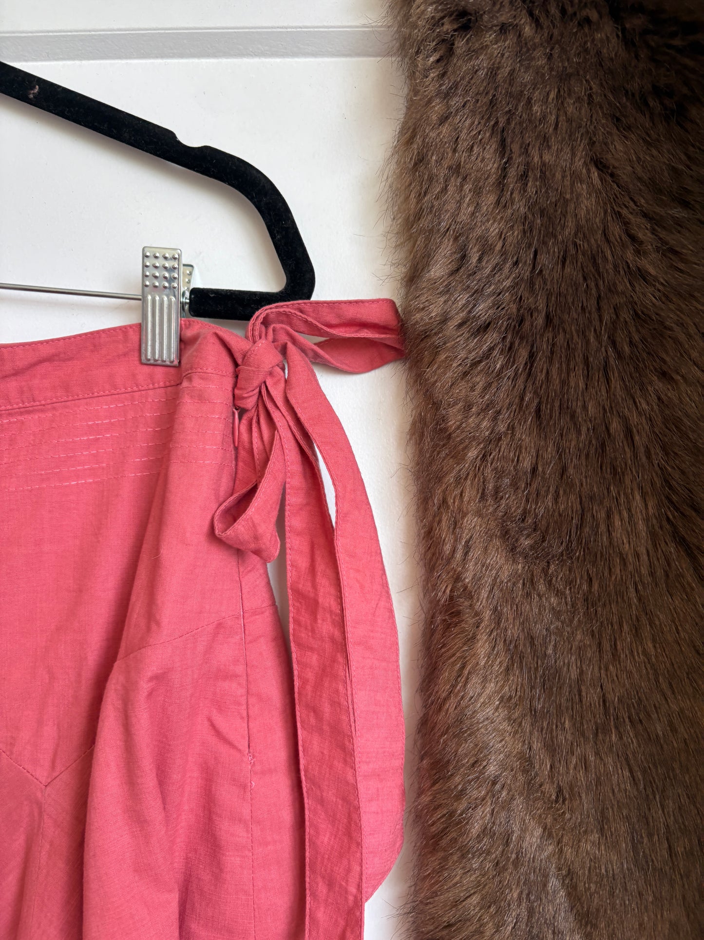 PINK ASYMMETRICAL SKIRT WITH A BOW