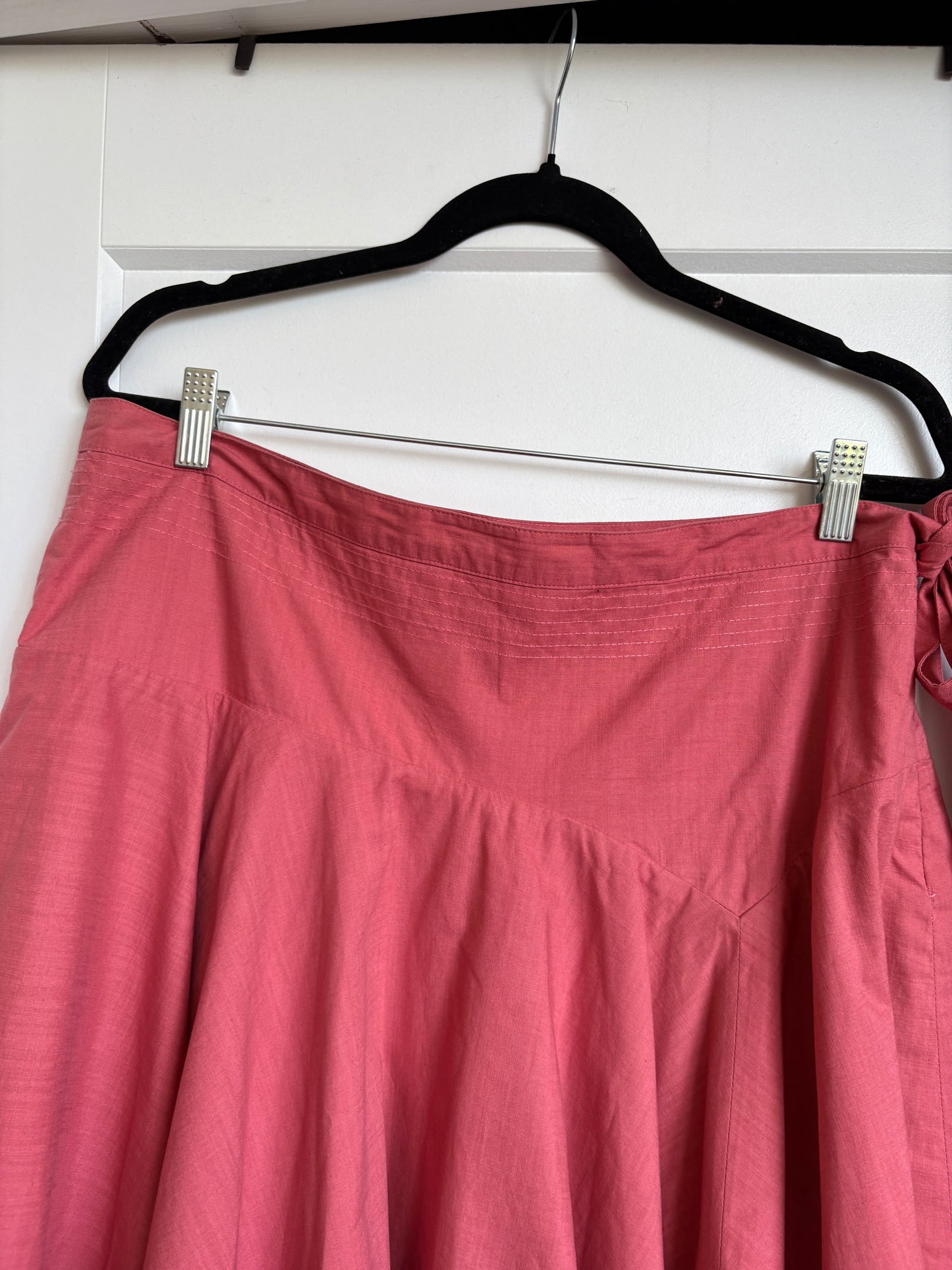 PINK ASYMMETRICAL SKIRT WITH A BOW