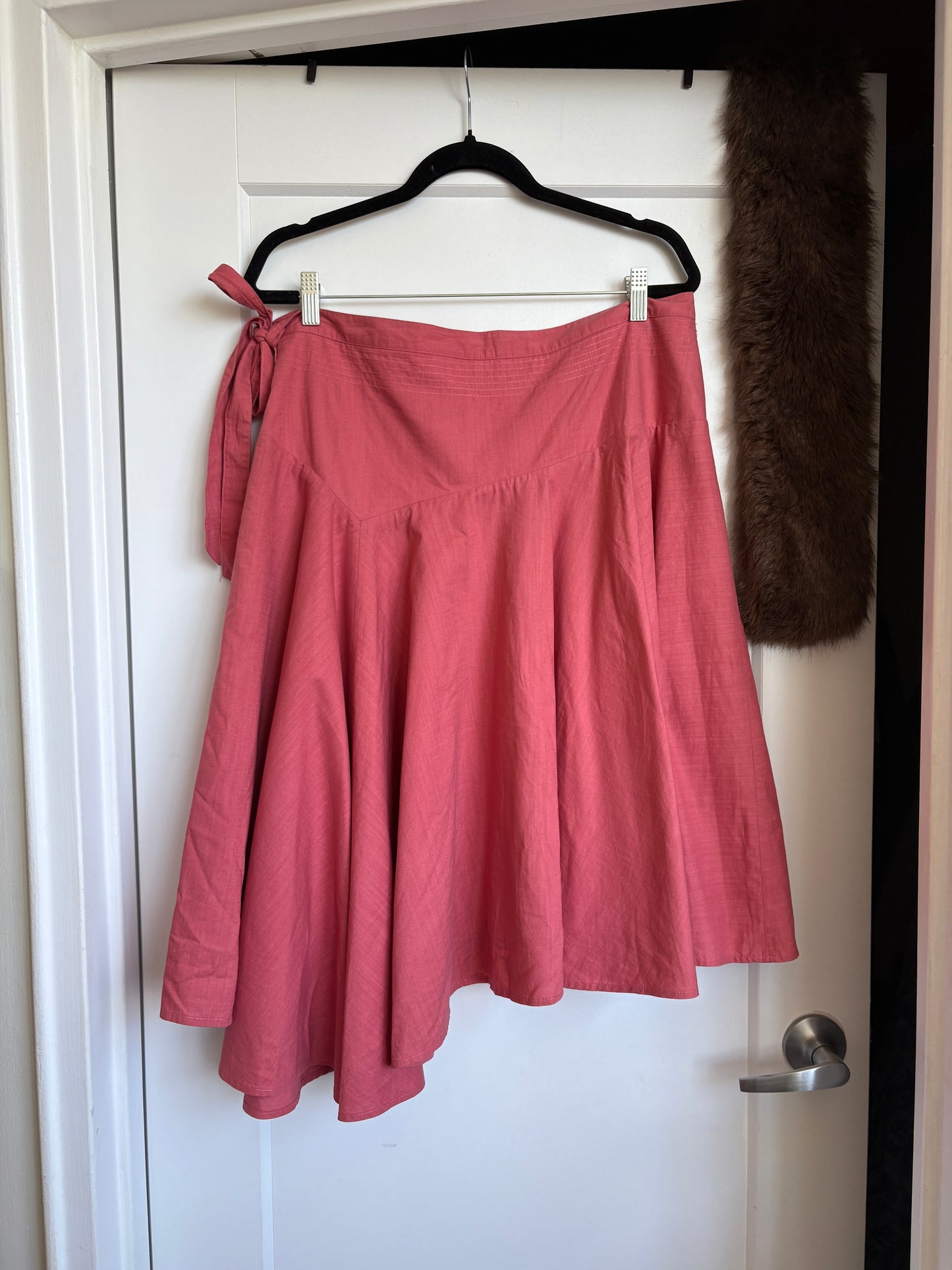 PINK ASYMMETRICAL SKIRT WITH A BOW