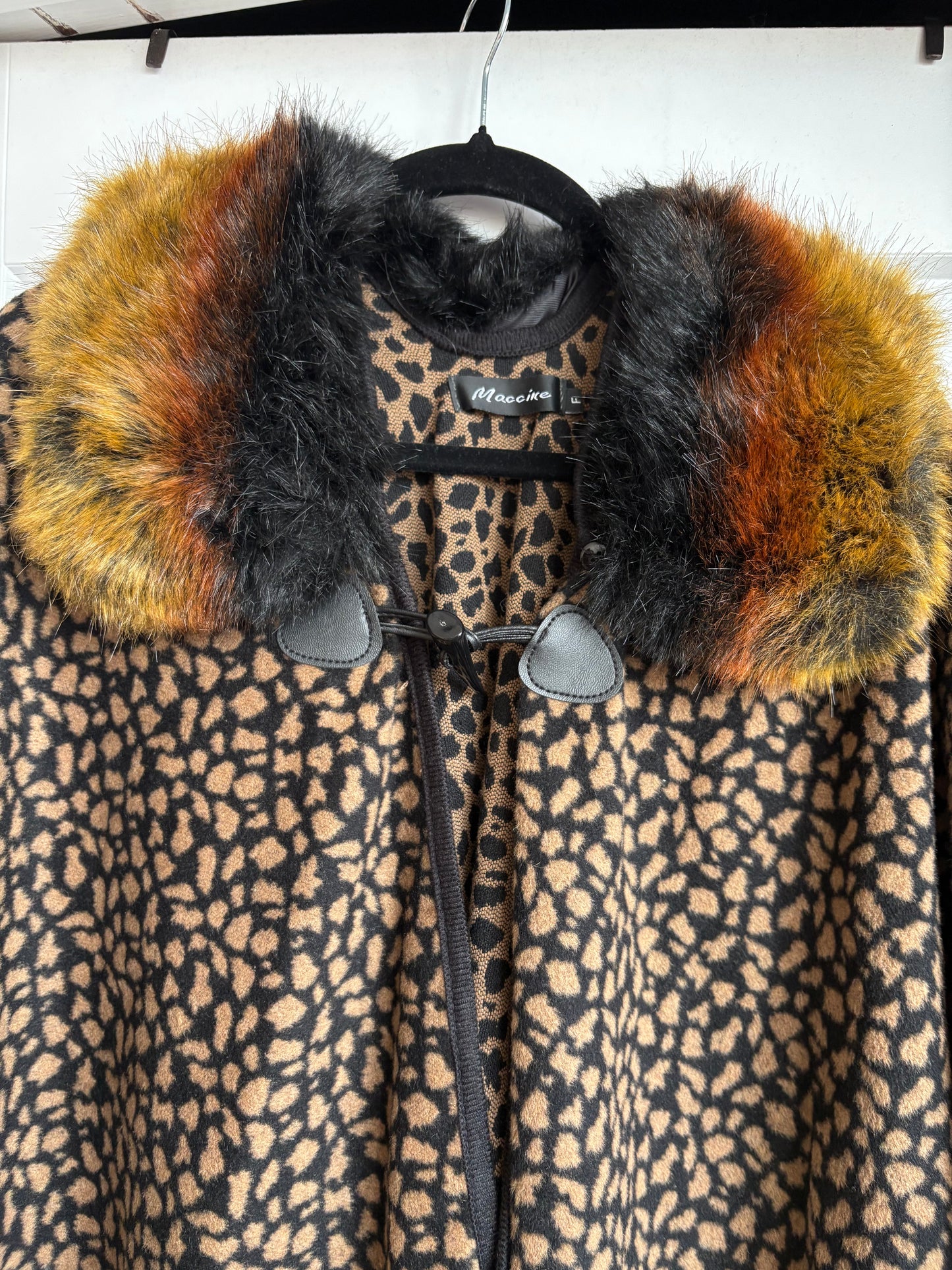 ANIMAL PRINT FAUX FUR PONCHO