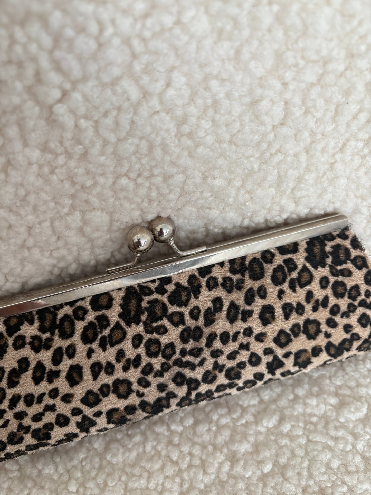 FAUX FUR ANIMAL PRINT CLUTCH