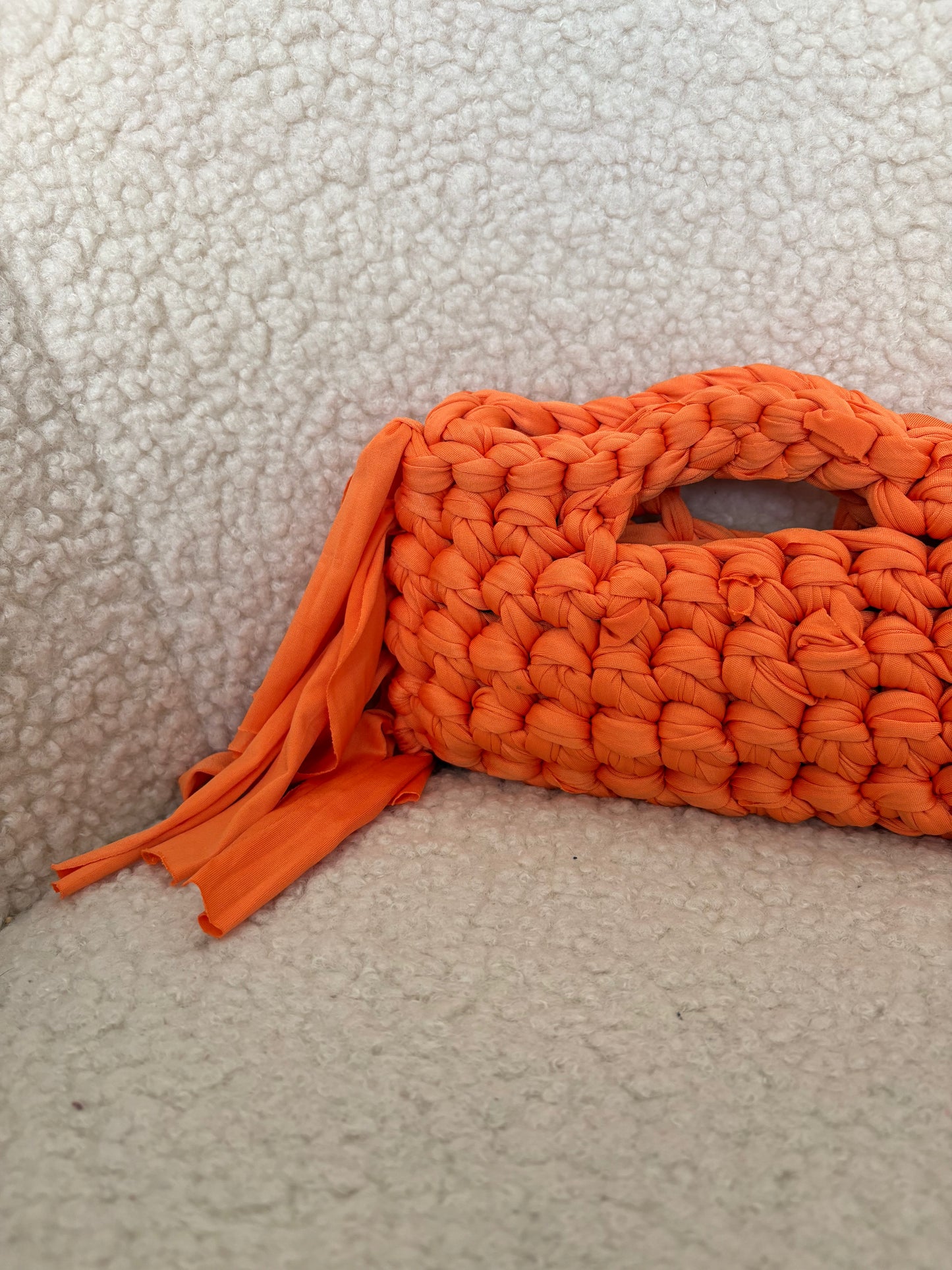 ORANGE FRINGE CROCHET CLUTCH