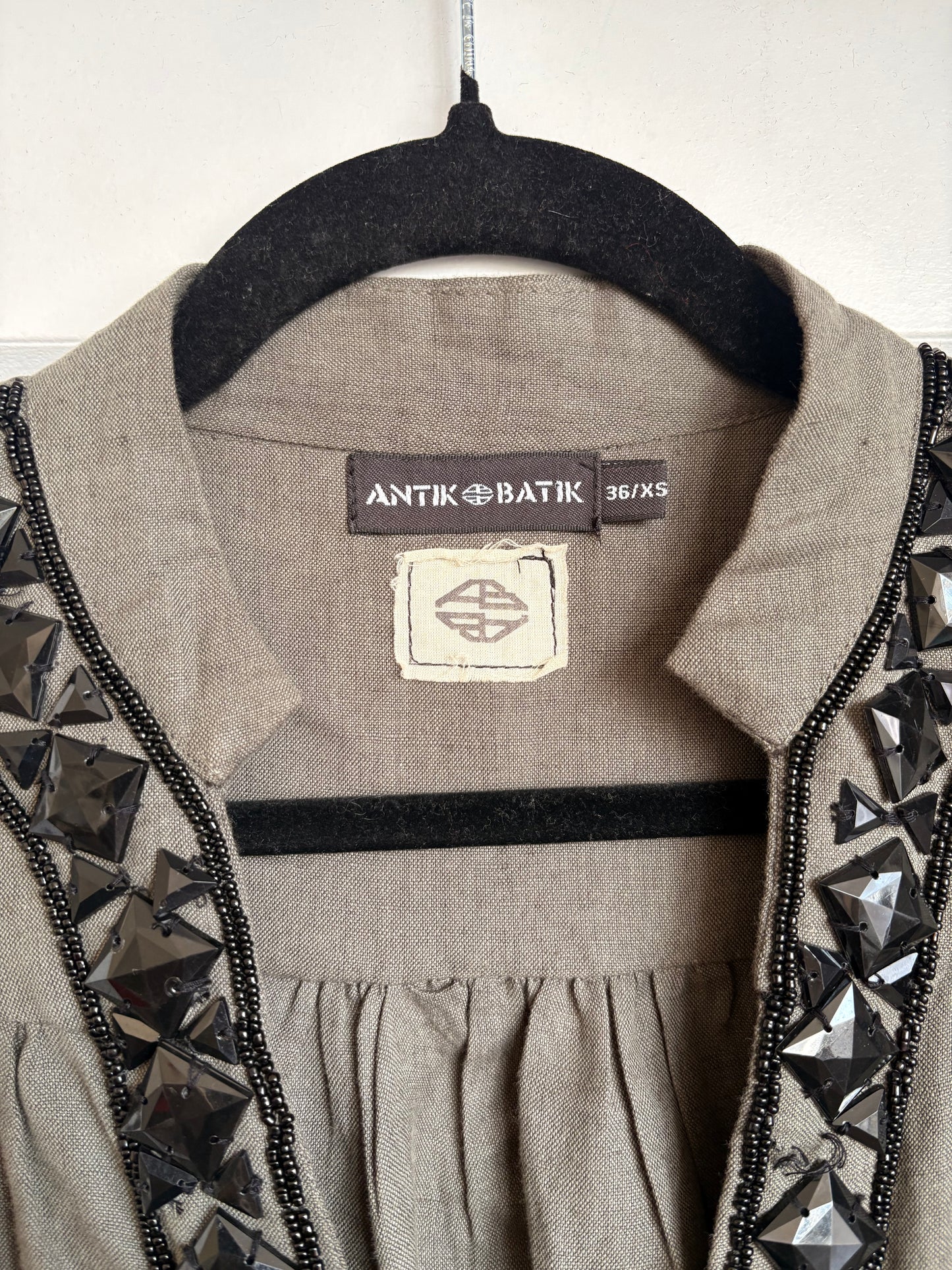 GREY DRESS WITH HEAVY BLACK JEWEL DETAILS - XS