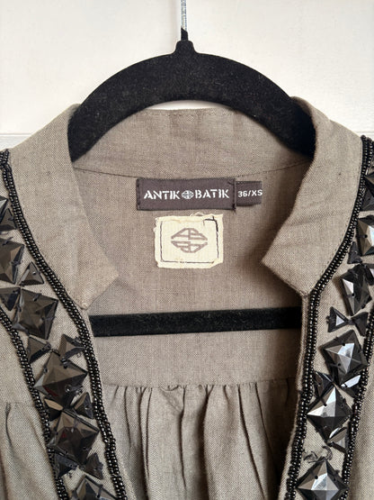 GREY DRESS WITH HEAVY BLACK JEWEL DETAILS - XS