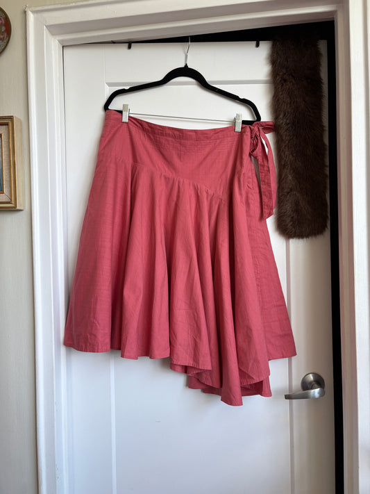 PINK ASYMMETRICAL SKIRT WITH A BOW